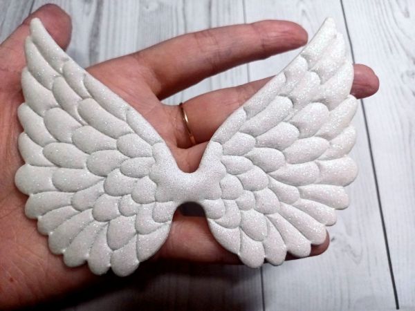 Крильця, білі, екошкіра. Розмір 12,3*8,7 см
